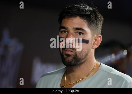 Philadelphia Phillies' Nick Castellanos blows a bubble as he walks to the  dugout during a baseball game against the Cincinnati Reds in Cincinnati,  Friday, April 14, 2023. The Phillies won 8-3. (AP