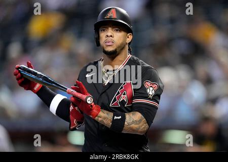 Arizona Diamondbacks' Ketel Marte walks back to the dugout after striking  out against the Los Angeles Dodgers during the first inning of a baseball  game Thursday, April 6, 2023, in Phoenix. (AP