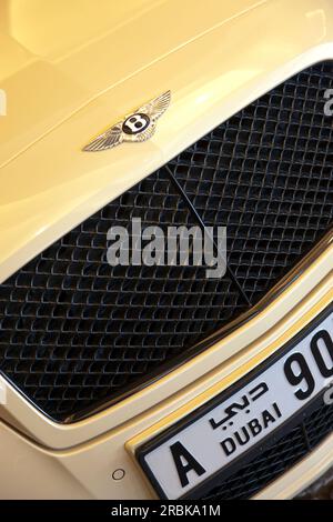 UAE, Dubai, bonnet of Bentley executive car at the Dubai Mall with Dubai plate Stock Photo