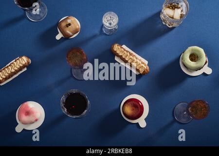 Delicious Cakes And Drinks On The Table Stock Photo