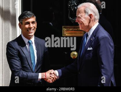 London, UK. 10th July, 2023. Joe Biden (Joseph Robinette Biden Jr.), President of the United States of America, is welcomed to 10 Downing Street by Rishi Sunak, Prime Minister of the United Kingdom, both then reappear after short meetings and Mr. Biden exits Downing Street in the motorcade. Biden is visiting the UK to meet the PM, and later King Charles, before he travels on the the NATO summit in Lithuania. Credit: Imageplotter/Alamy Live News Stock Photo