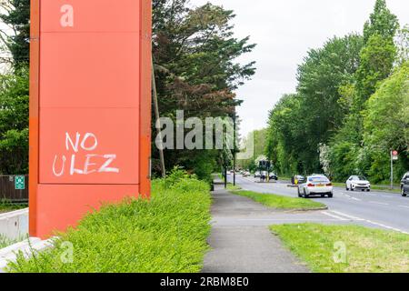 Anti Ultra Low Emission Zone No ULEZ graffiti on the A20 road into London near Orpington in Kent. Stock Photo