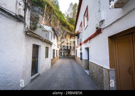 Calle Cuevas de la Sombra Street - Setenil de las Bodegas, Andalusia, Spain Stock Photo