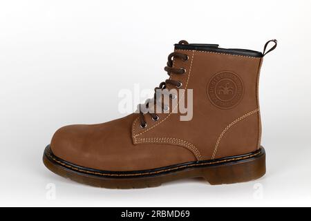 BANGKOK, THAILAND - July 10, 2023 : Close-up HEAVY Safety Shoes isolated on White Background. Genuine leather shoes with steel toe caps for protection Stock Photo