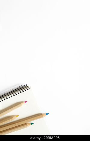 Office notebook and different paper clips on blue background Stock ...