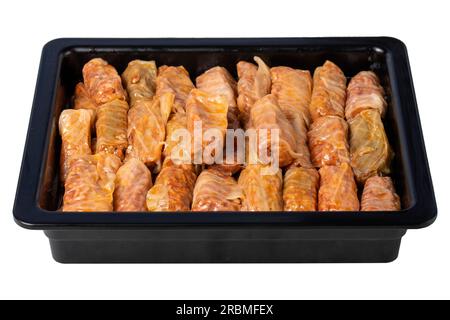 Cabbage wrap isolated on white background. Turkish cuisine delicacies. healthy appetizers. Local name lahana sarması Stock Photo