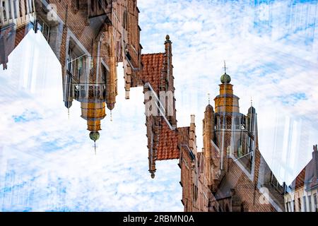 Double exposure of a stepped gable house and the Jerusalem church in Bruges, Belgium. Stock Photo