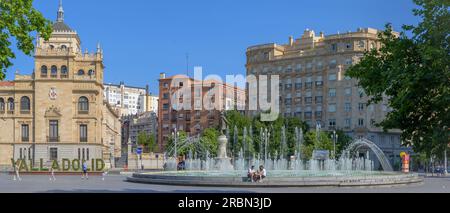 Summer Mornings Unveiled: Zorrilla Square's Enchanting Fountain View Stock Photo