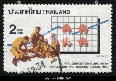 RUSSIA KALININGRAD, 31 MAY 2016: stamp printed by Thailand, shows a man carring out a census, circa 1990 Stock Photo