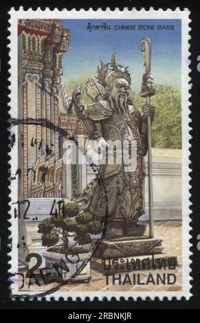 RUSSIA KALININGRAD, 2 JUNE 2016: stamp printed by Thailand, shows chinese stone statue, circa 1998 Stock Photo