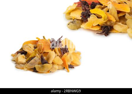 Mix of dried exotic fruit, mangos,slices of pineapples, passion fruit, papaya. Vegetarian dessert. Stock Photo