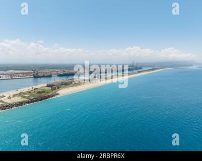 Gigantic trading port with cargo ships Stock Photo
