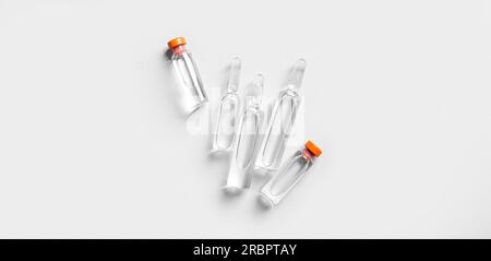 Medical ampules on light background Stock Photo