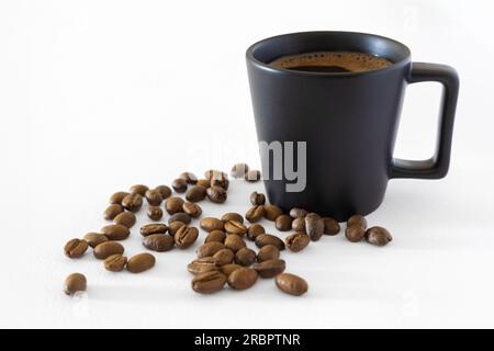 Coffee cup and coffee beans isolated on white background Stock Photo