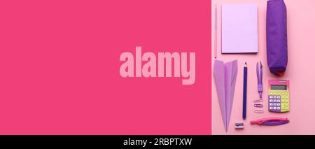 Paper plane with school supplies on pink background with space for text Stock Photo