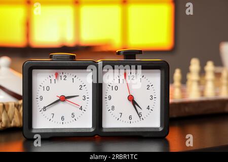 Chess clock on table in room, closeup Stock Photo