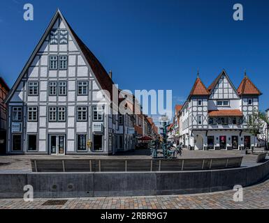At the Ostertor in Lemgo: Kanzlerbrunnen by Bonifatius Stirnberg (1977), half-timbered houses at the confluence of Mittelstraße, old town of Lemgo, No Stock Photo