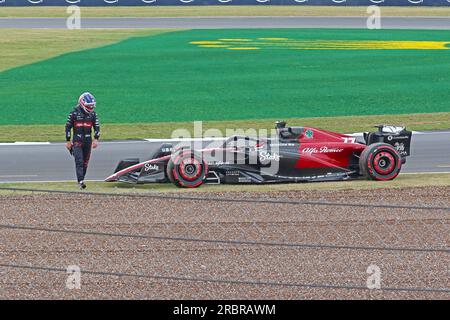 Kevin Magnussen climbs out of his broken down - Hass recovery at Stowe and Vale corners, Silverstone British F1 GP Qualifying 8th July 2023 Stock Photo