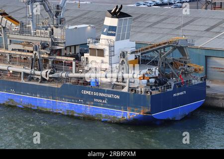 The Marine Aggregate Dredger (MAD) Cemex Go Innovation, used for dredging sand and gravel to a depth of 55 metres, moored at Southampton docks. Stock Photo