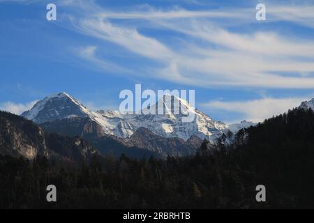 Famous mountains Eiger and Monch seen from Interlaken Stock Photo - Alamy