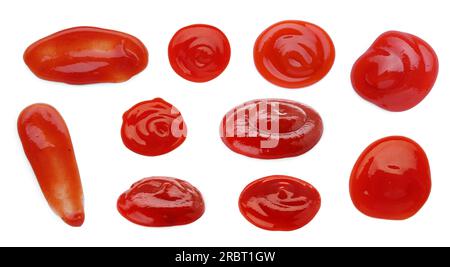 Set of different ketchup smears on white background Stock Photo