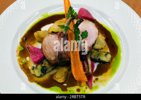 Dish with chop and vegetables, Hotel Fairmont Reine Elizabeth, Montreal, Quebec, meat, pork, Canada Stock Photo