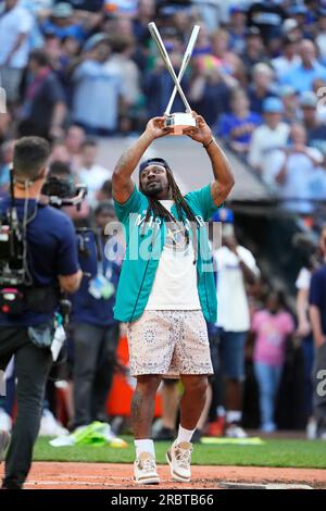Former Seattle Mariner Ken Griffey Jr. reviews his photos as he takes  pictures during the MLB All-Star baseball Home Run Derby, Monday, July 10,  2023, in Seattle. (AP Photo/Lindsey Wasson Stock Photo 