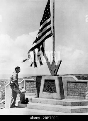 Iwo Jima, Japan:  July 8, 1946 World War Two photographer Joe Rosenthal who made the historic Iwo Jima flag raising image on Mt. Suribachi on February 23, 1945, visits the monument on Iwo Jima which now marks the spot. Stock Photo