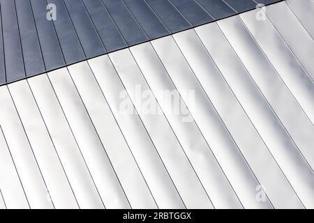 Shiny new roof made of stainless steel, abstract architecture, background photo texture Stock Photo