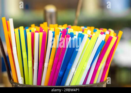 Background from many multi-color tubules for a cocktail, Background of colorful tubules Stock Photo