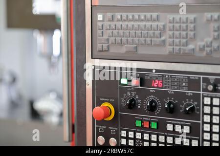 Control panel of industrial CNC milling machine. Selective focus. Stock Photo