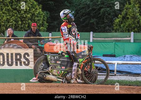 Wolverhampton, UK. 10th July 2023Charles Wright sits on the pit entrance just off the track after his engine failure during the Sports Insure Premiership match between Wolverhampton Wolves and Belle Vue Aces at Monmore Green Stadium, Wolverhampton on Monday 10th July 2023. (Photo: Ian Charles | MI News) Credit: MI News & Sport /Alamy Live News Stock Photo