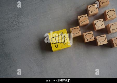 Megaphone and speech bubble. Advertising, communication, announcement, feedback, public opinion concept Stock Photo