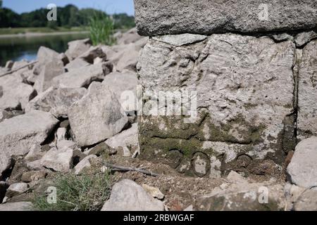 11 July 2023, Saxony, Dresden: Hunger stones on the banks of the Elbe ...