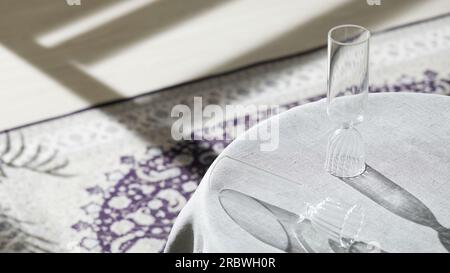 Vases and objects on the table in a warm room with sunlight coming in Stock Photo
