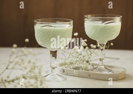 Aesthetic green healthy cocktails. Low alcohol, zero proof drinks. Natural light Stock Photo