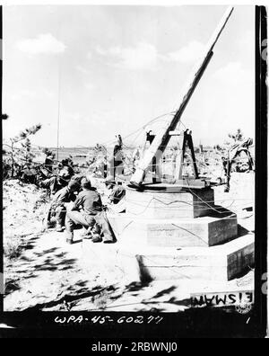 An imitation anti-aircraft gun is seen positioned on the beach of Wakayama, Japan during World War I. This photograph is part of the collection documenting American military activities, identified as WPA-45-60277 S. Stock Photo