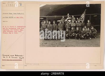 Caption: 'Victor E. Bertraudias and his mechanics from the 94th Aero Squadron at the 1st Pursuit Camp, 26th Division, near Toul, France, on May 9, 1918. Photographed by Corp. Keen Polk, this image was censored and released on August 18, 1918. [Not for publication]' Note: The caption includes specific details such as names, dates, locations, and a reference to censorship for accurate documentation purposes. Stock Photo
