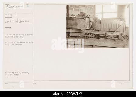 Cpl. Tysell prepares to crate a light aviation truck on skid at Camp Holabird, MD, in January 1919. The photograph was taken on Jan. 29, 1919, and approved by the M.I.D. censor on Jan. 30, 1919. This activity was a part of a crating class for trucks at the camp. Stock Photo