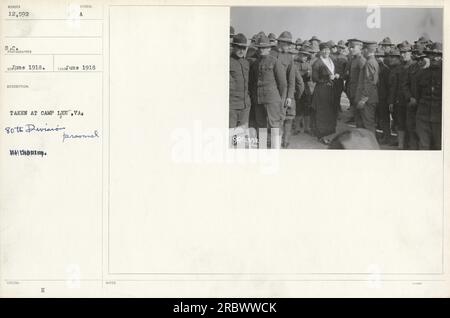 Image capture at Camp Lee, VA in January 1918 featuring the 80th Division Maltin, a unit of American military during World War One. In the picture, soldiers are seen with the symbol 'A' indicating issued uniforms and equipment. This photograph is numbered 12,592 from the collection. Stock Photo