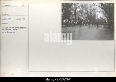 A parade of the 159th Brigade in Petersburg, Virginia, showcasing the 80th Division during World War One. Photograph taken in June, 1918. The image appears in the official records with the reference number 111-SC-12790. Stock Photo