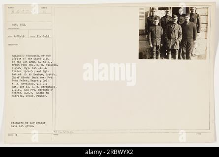 LT. COL. GEO. LUBEROFF, Chief Q.M. of the 1st Army, is pictured with some  of his assistants. In the front row, from left to right, are Lt. Cel.  Jeremiah Beall, Ord., Chief