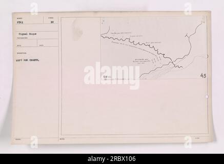 An American soldier studying maps and charts of Region de Laon during ...