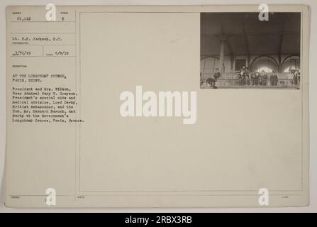 At the Longchamp Course in Paris, France, President Wilson and his entourage including Rear Admiral Cary T. Grayson, Lord Derby, and Mr. Bernard Baruch, attended an event. The photograph was taken by Lt. E.N. Jackson on May 8, 1919, and issued with the official description and notes by the U.S. government. Stock Photo