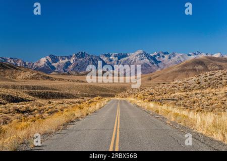 Sierra Nevada in distance, Death Valley Road east of Big Pine, late fall, Mojave Desert, California, USA Stock Photo