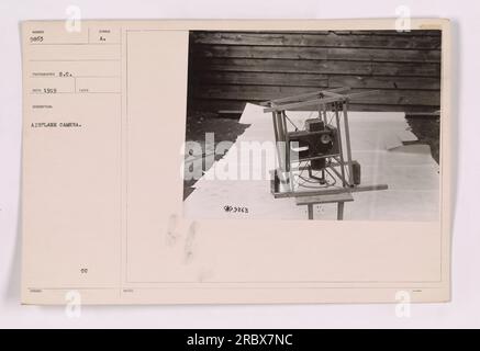 A black and white photograph of an airplane camera, MINGER 9863, taken in 1919 by photographer S.C. Sed. The camera is mounted on the front of the airplane, with a symbol reading 'A' for Airplane Camera Base CC. The description includes the photographer's initials (S.C. Sed) and notes that indicate *9263. Stock Photo