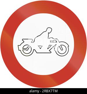 Old design (1937) of German sign prohibiting thoroughfare for motorcycles on sundays and public holidays. Stock Photo