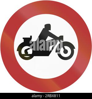 Old design (1956) of German sign prohibiting thoroughfare for motorcycles. Stock Photo