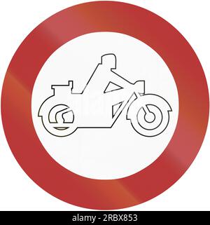 Old design (1956) of German sign prohibiting thoroughfare for motorcycles on sundays and public holidays. Stock Photo
