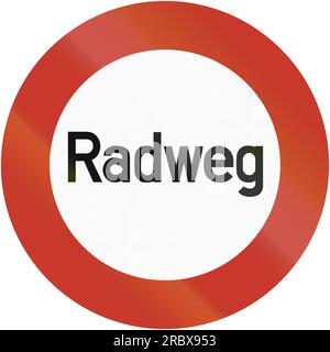 Old design (1937) of a German bicycle road sign. It says: Bike road Stock Photo